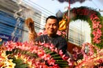 A procession of Buddhas sees a lot more water thrown about